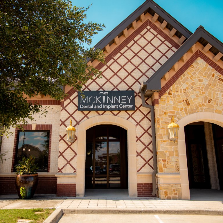 McKinney Dental & Implant Center exterior with team